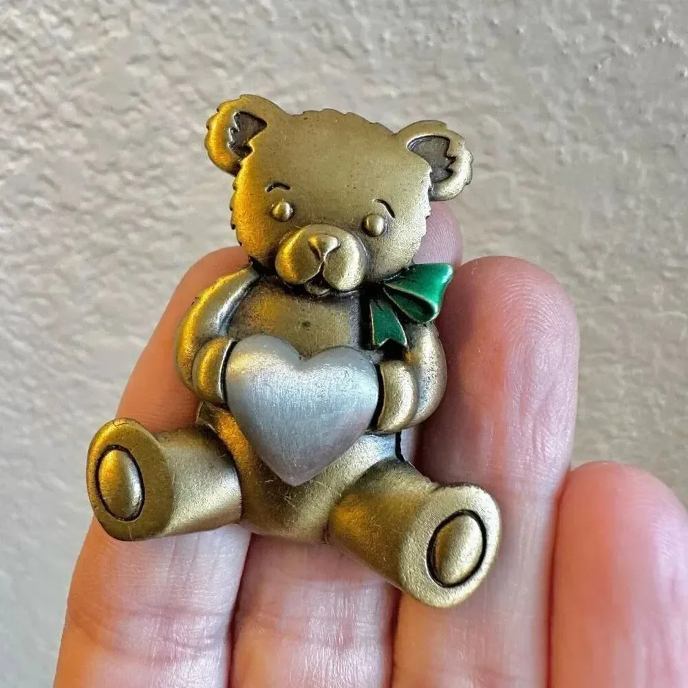 Jeanette Jewelry Gold and  Silver tone Bear holding a heart brooch